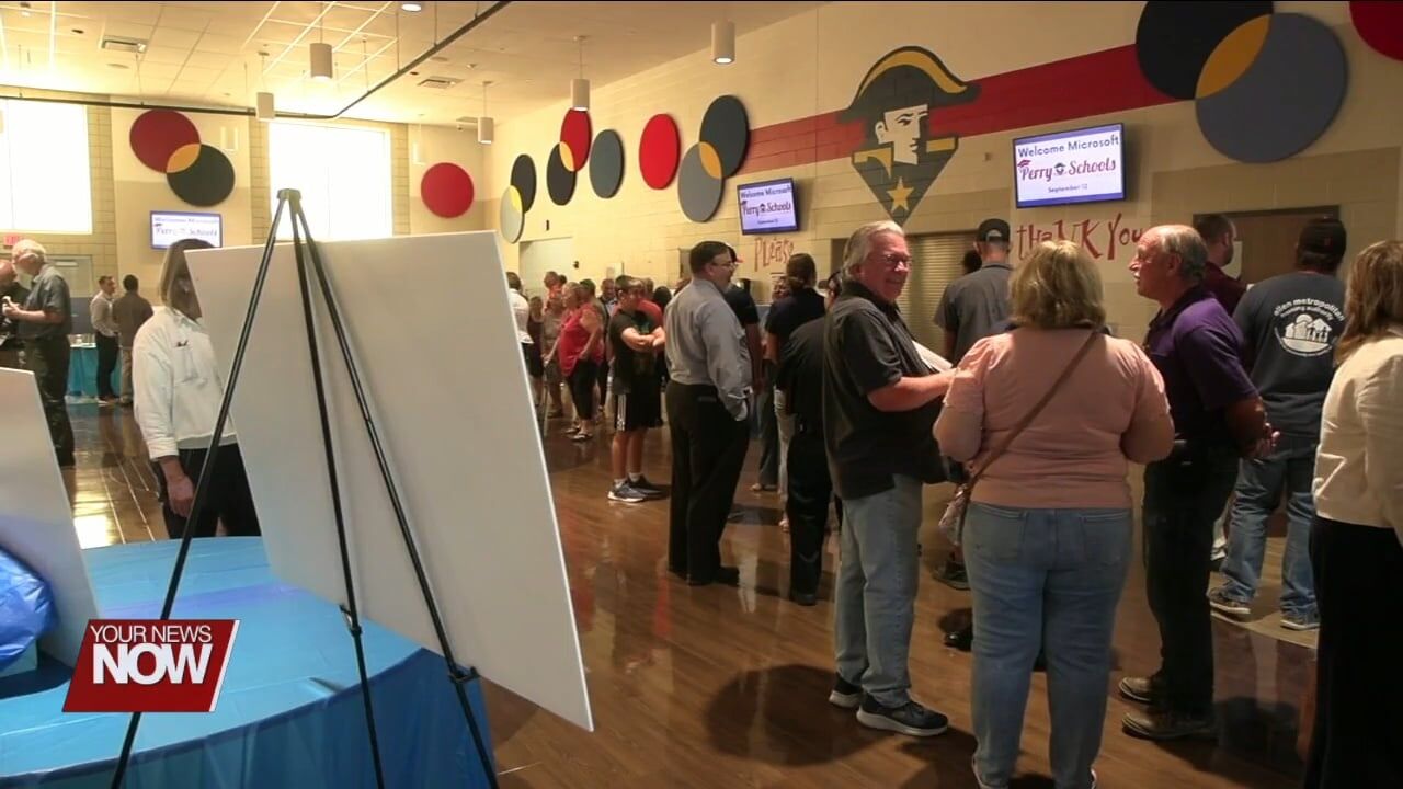 Microsoft employees talk one-on-one with Perry Township residents about potential data center